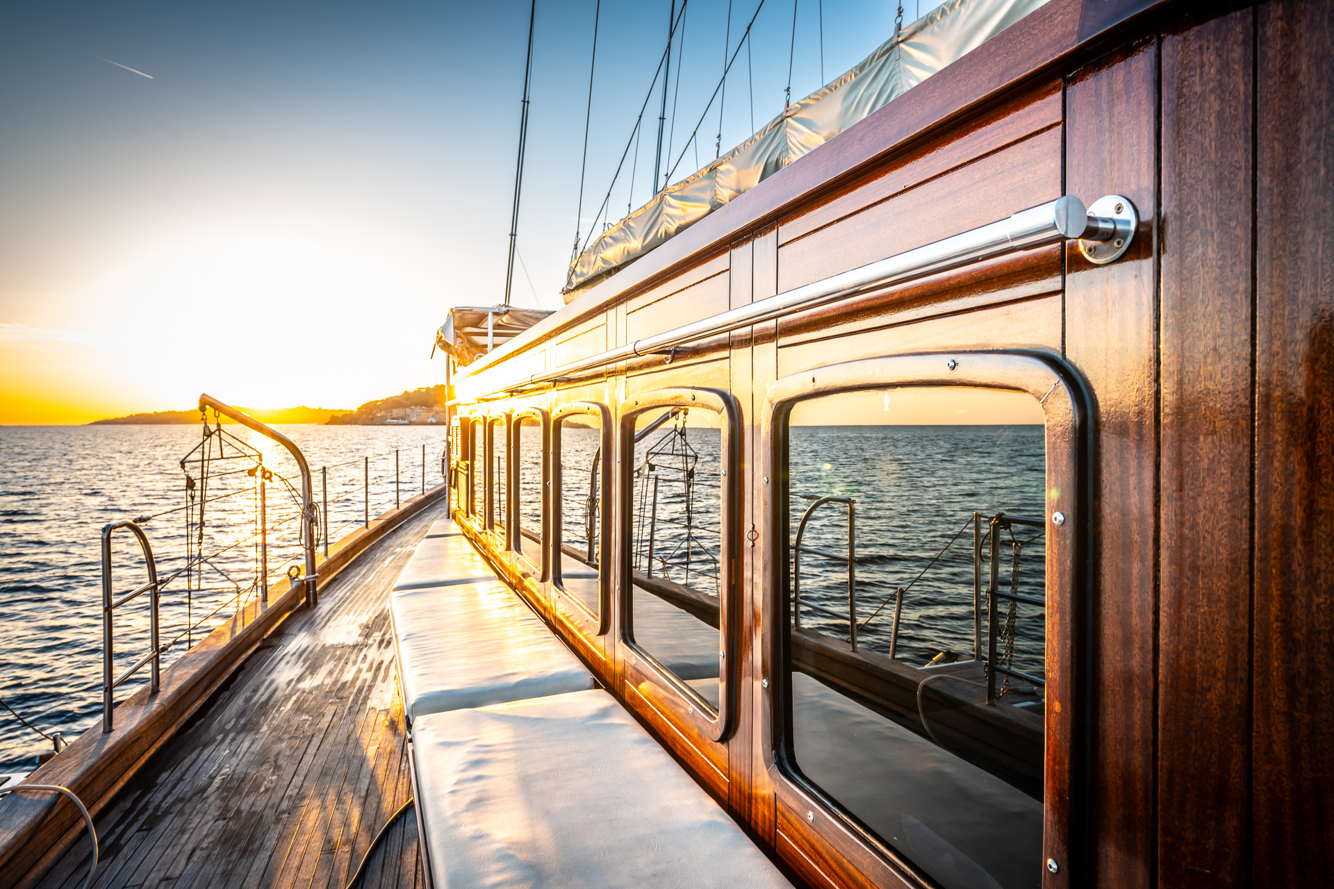 Close up of a large classic sailing yacht at sunset 