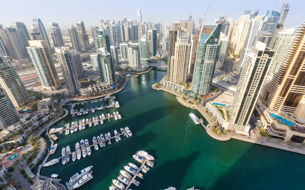 Dubai harbor surrounded by skyscrapers